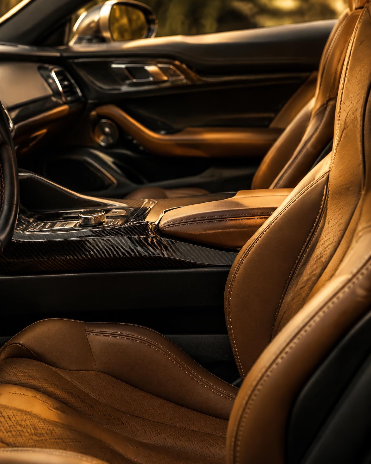 Hand-stitched tan leather interior